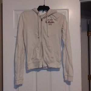 Hollister Women's zip up white hoodie